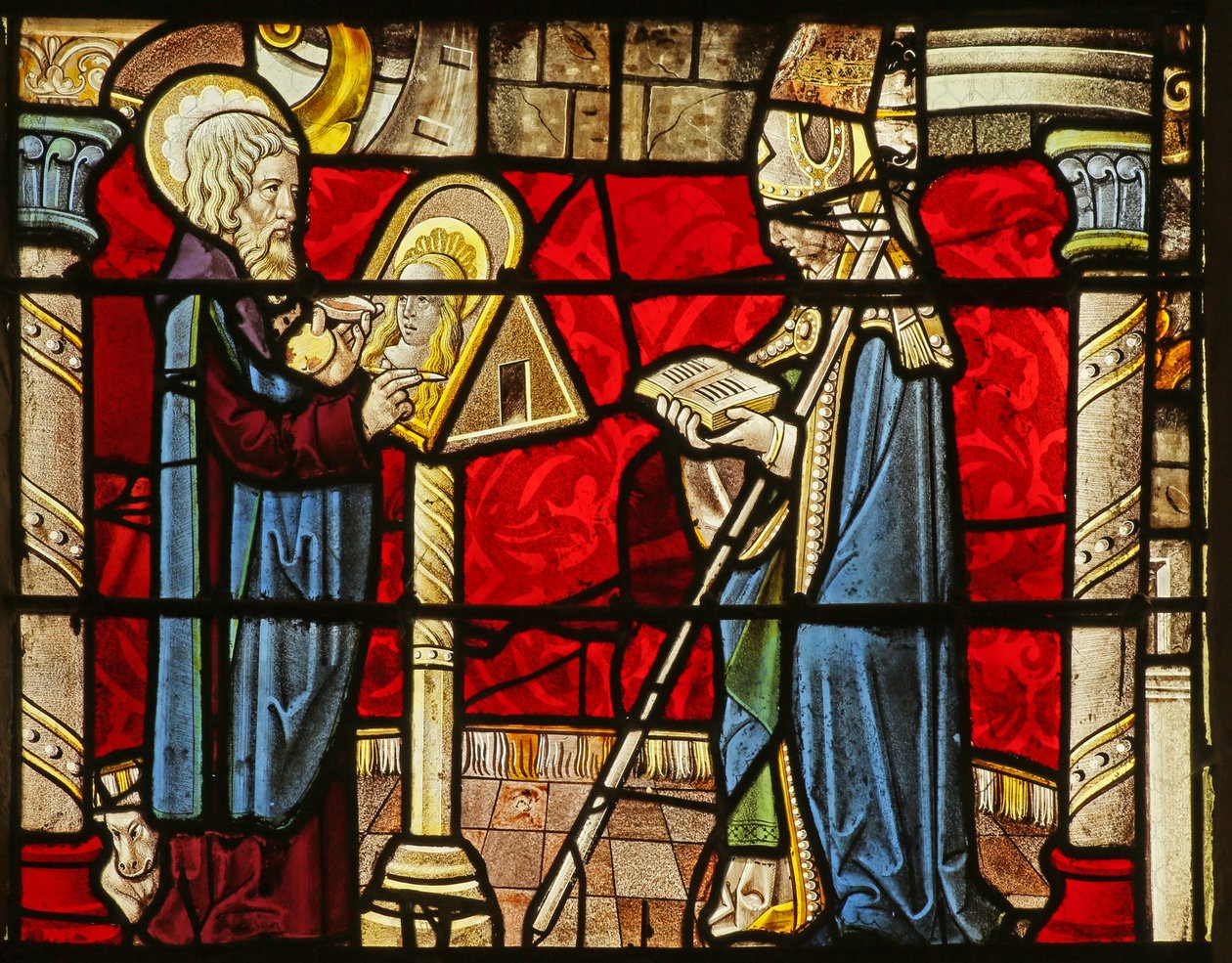 Ventana que representa a San Lucas pintando un retrato de la Virgen María de French School