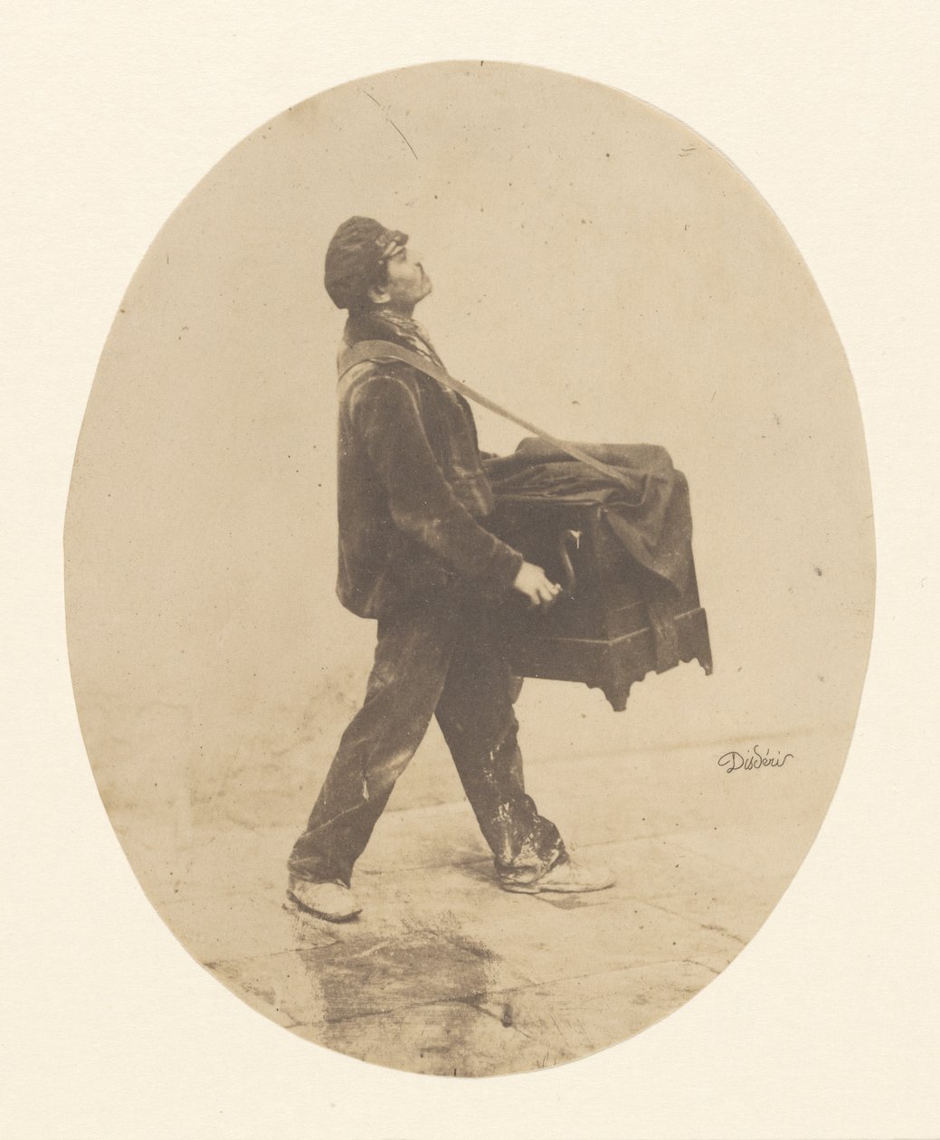 El organillero de Andre Adolphe Eugene Disderi