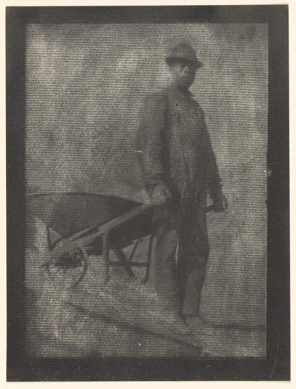 [Hombre negro con carretilla] de Doris Ulmann