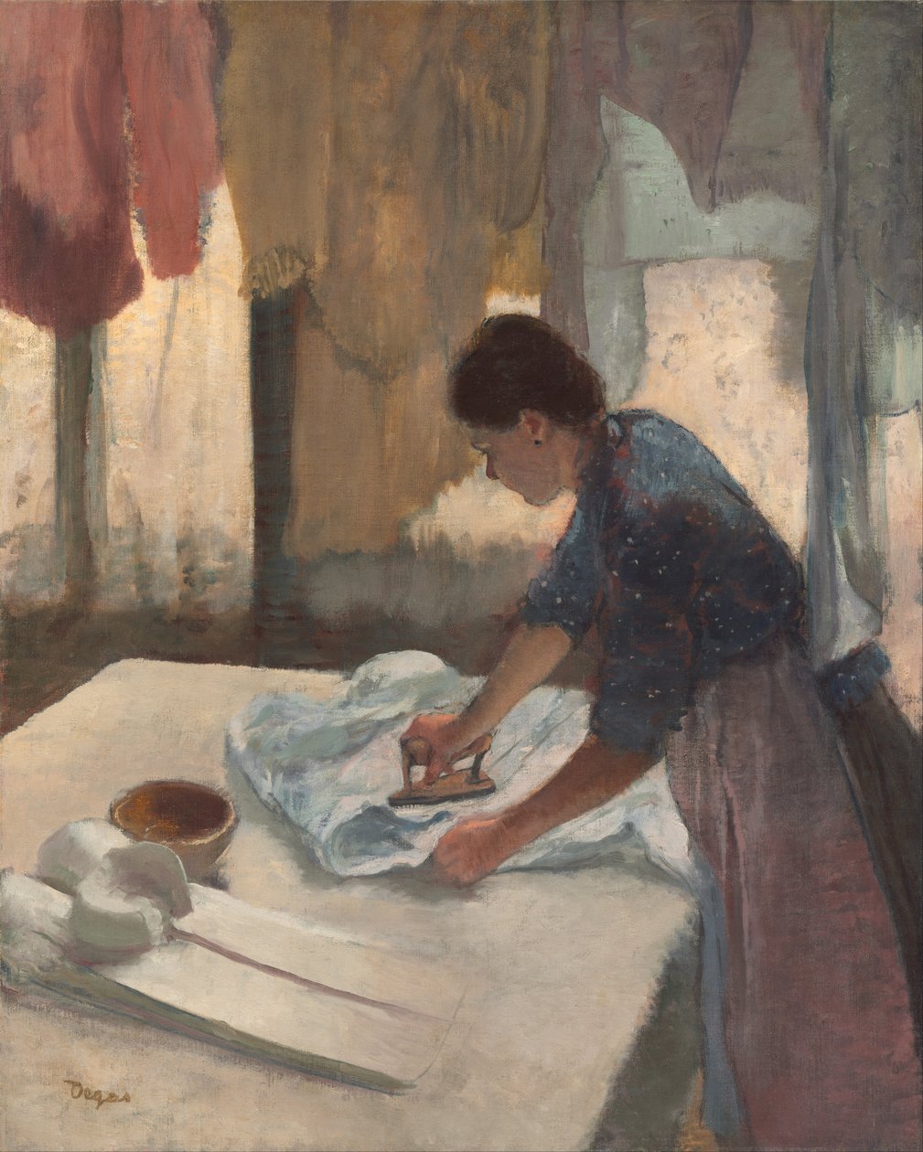 Mujer planchando de Edgar Degas