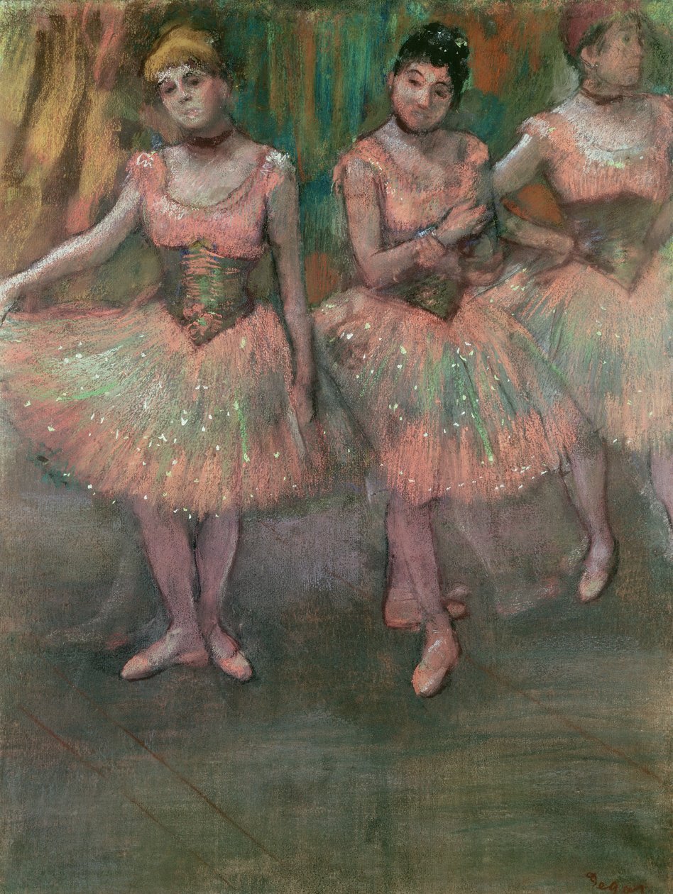 Bailarinas con faldas color salmón de Edgar Degas