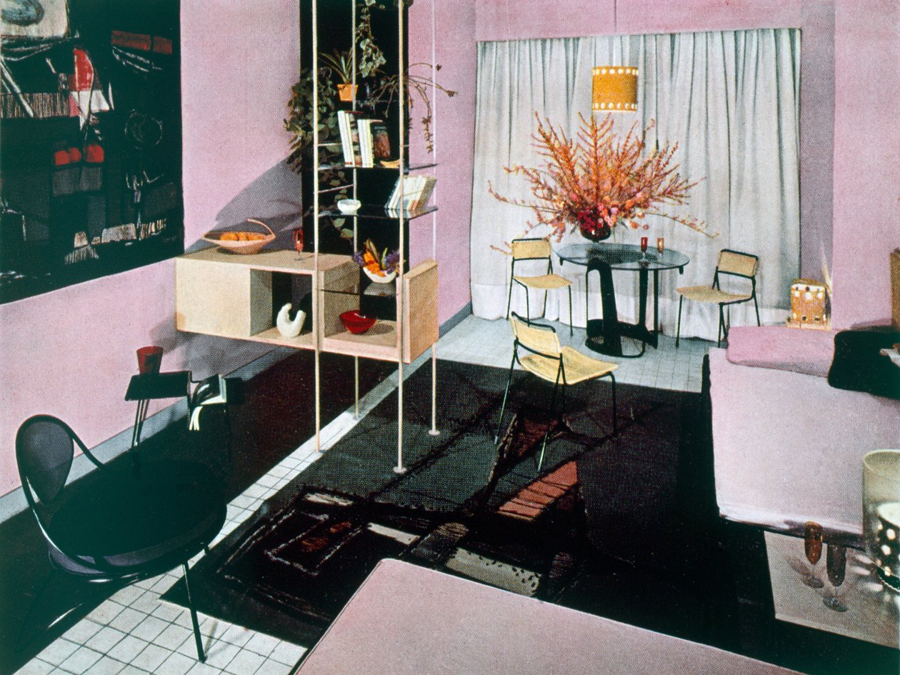 Ejemplo de una sala de estar-comedor, 1950s de English Photographer