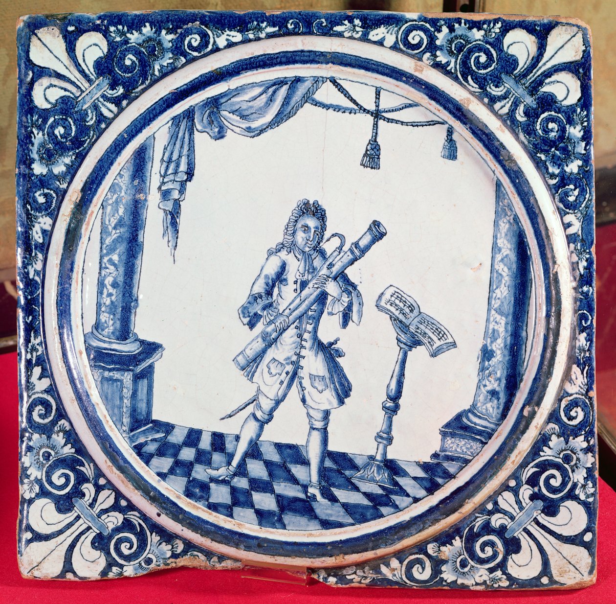 Azulejo que muestra a un fagotista, 1706 (faience) de French School