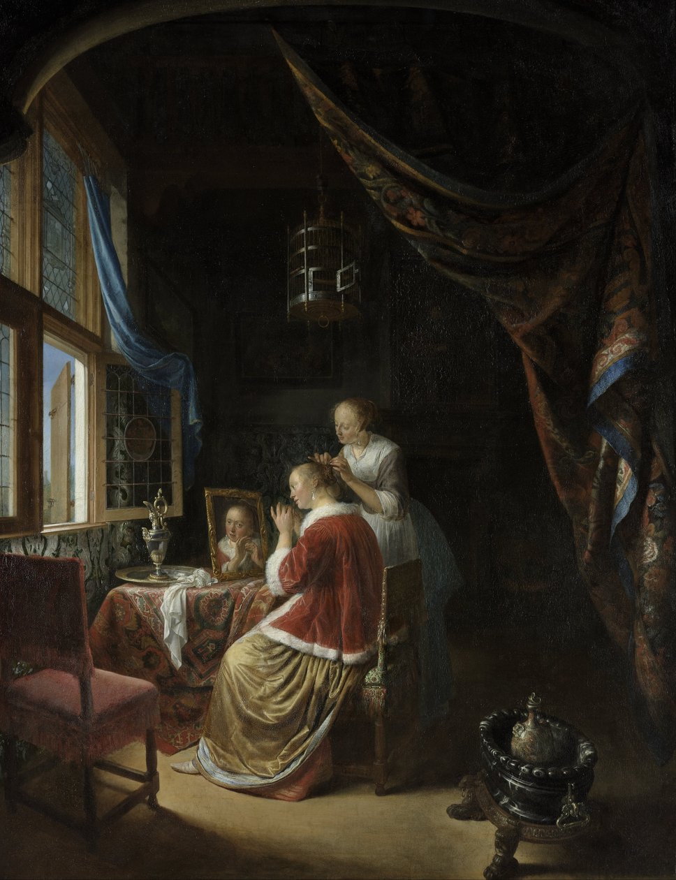 Mujer joven en su aseo de Gerrit Dou