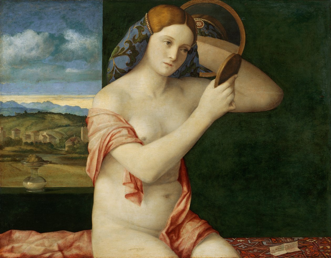 Joven mujer en su tocador de Giovanni Bellini