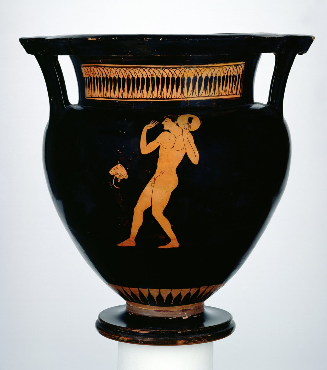 Crátera de figuras rojas que representa a un lanzador de disco de Greek School