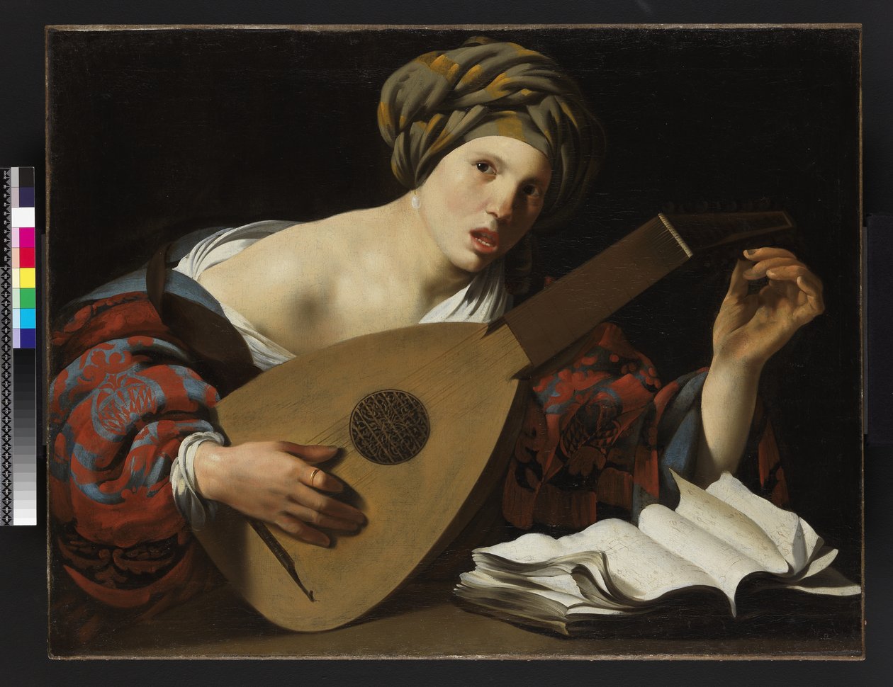 Joven mujer afinando un laúd, c.1626-27 de Hendrick ter Brugghen
