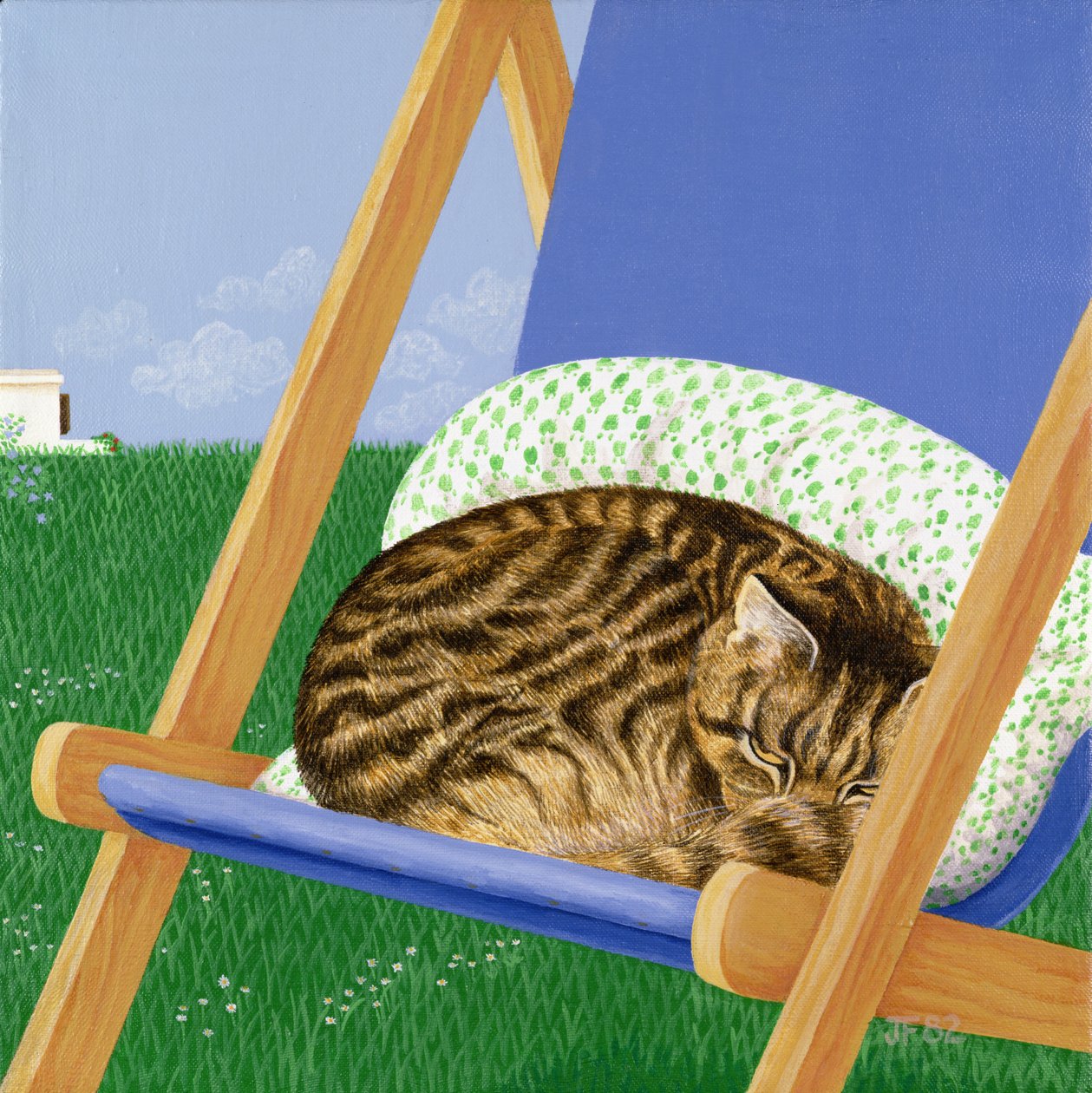 Gato atigrado dormido en una tumbona de Joan Freestone