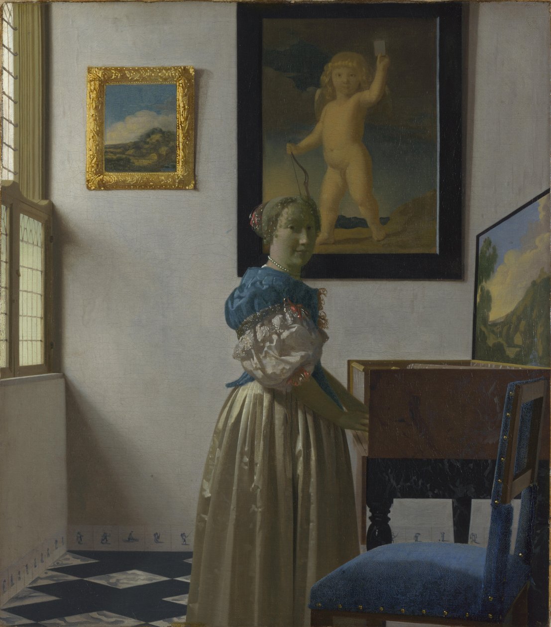 Una joven junto a un virginal de Johannes Vermeer