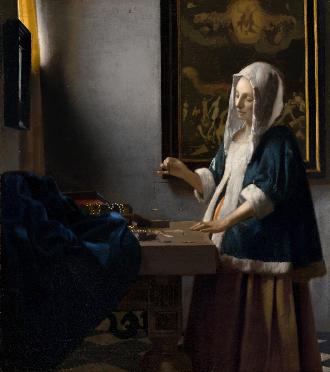 Mujer sosteniendo una balanza de Johannes Vermeer