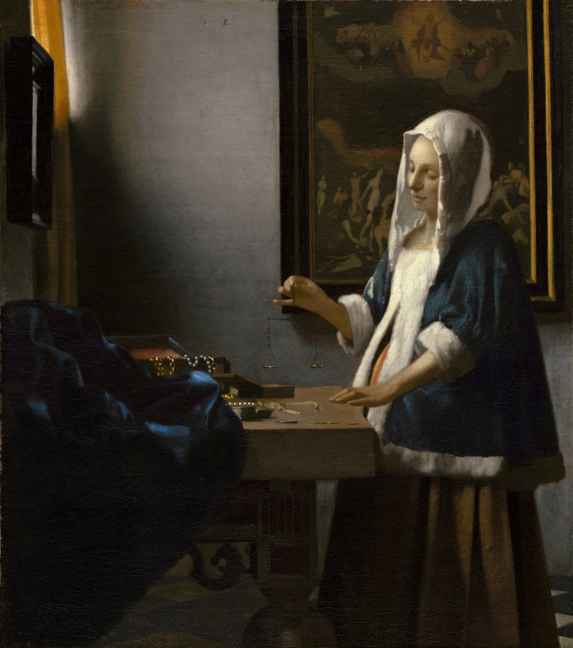 Mujer sosteniendo una balanza de Johannes Vermeer