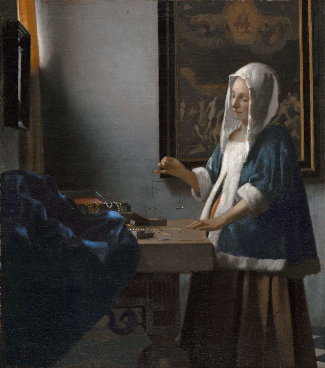 Mujer sosteniendo una balanza de Johannes Vermeer