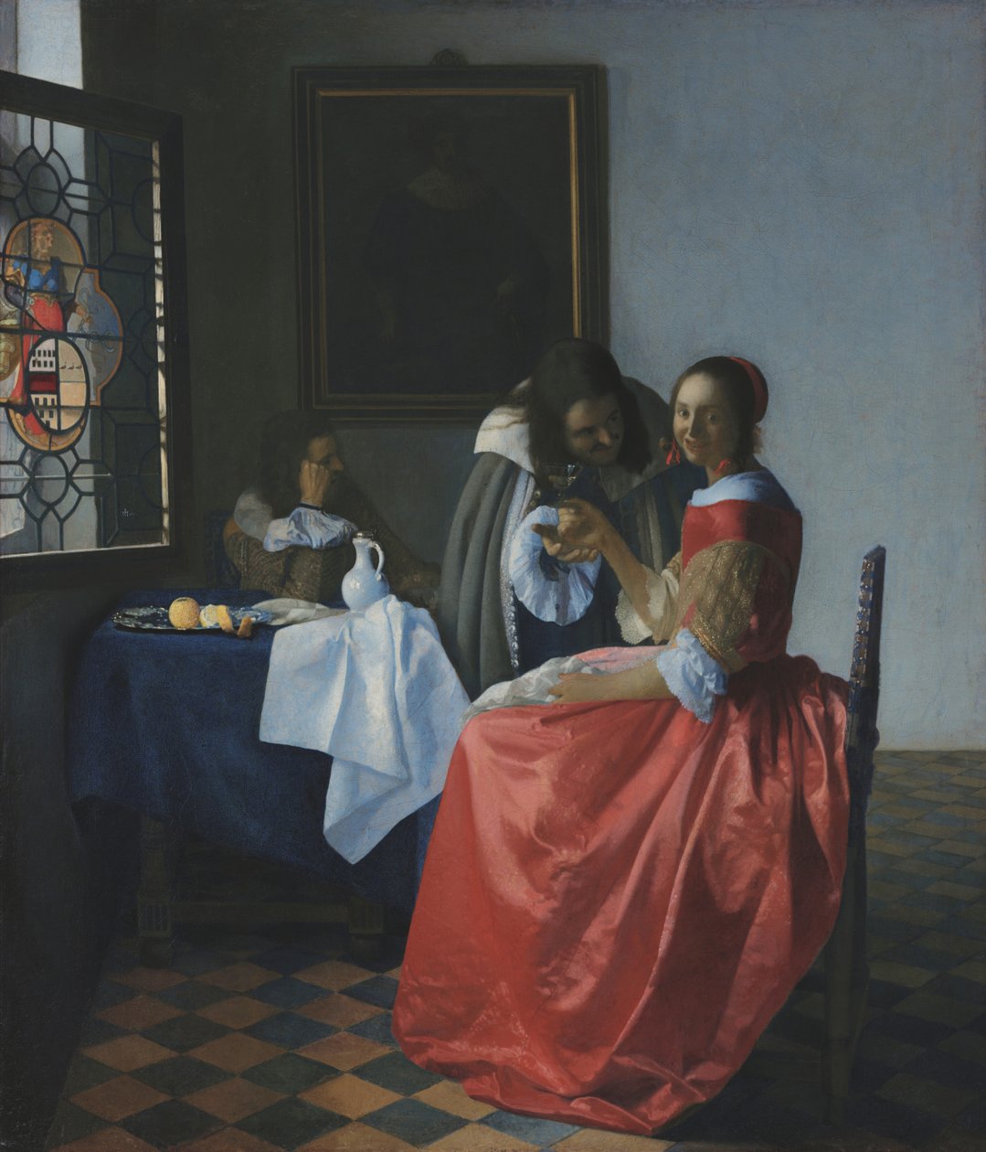 Mujer joven con una copa de vino de Johannes Vermeer