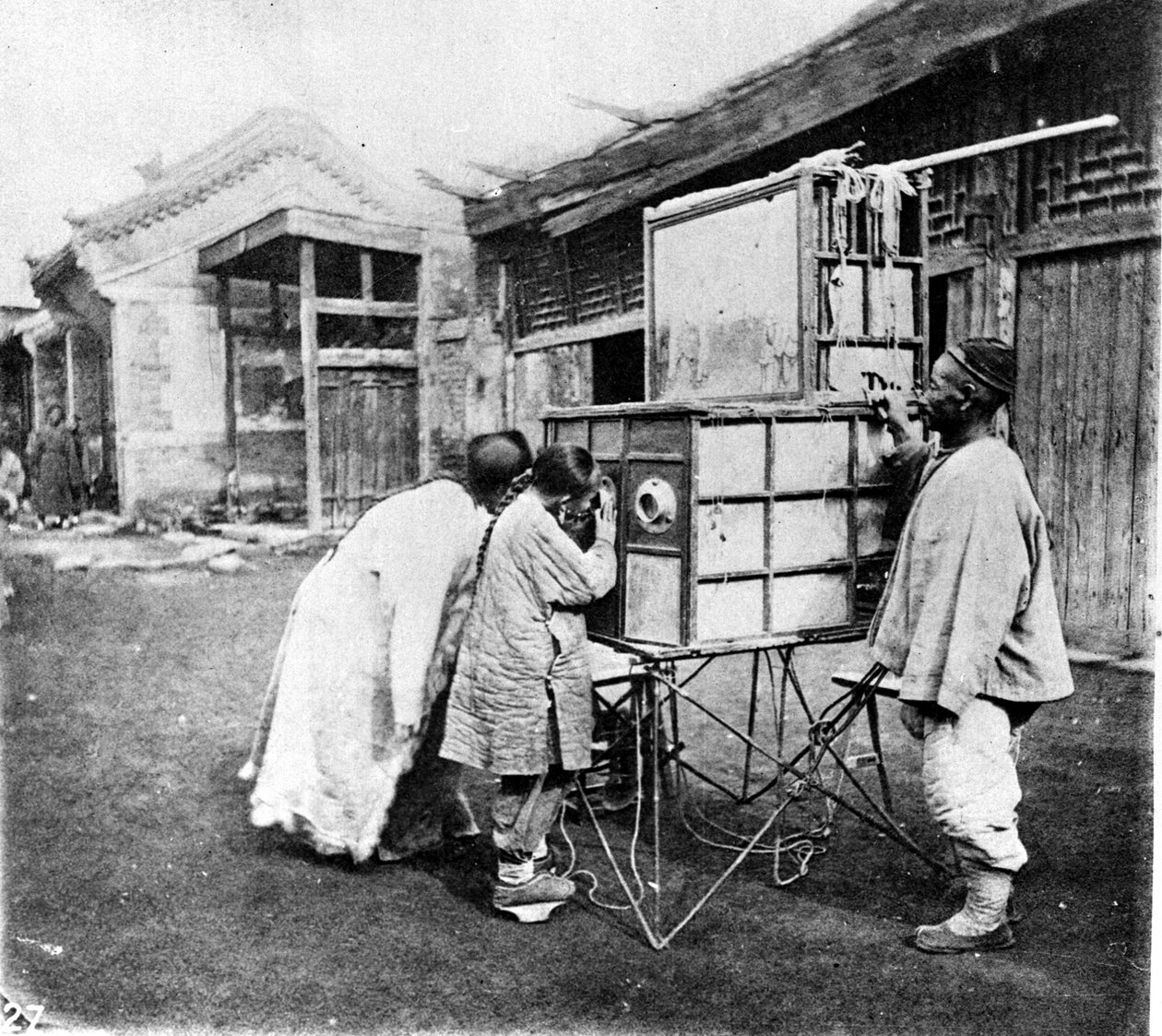 China, el espectáculo de mirilla, alrededor de 1870 de John Thomson
