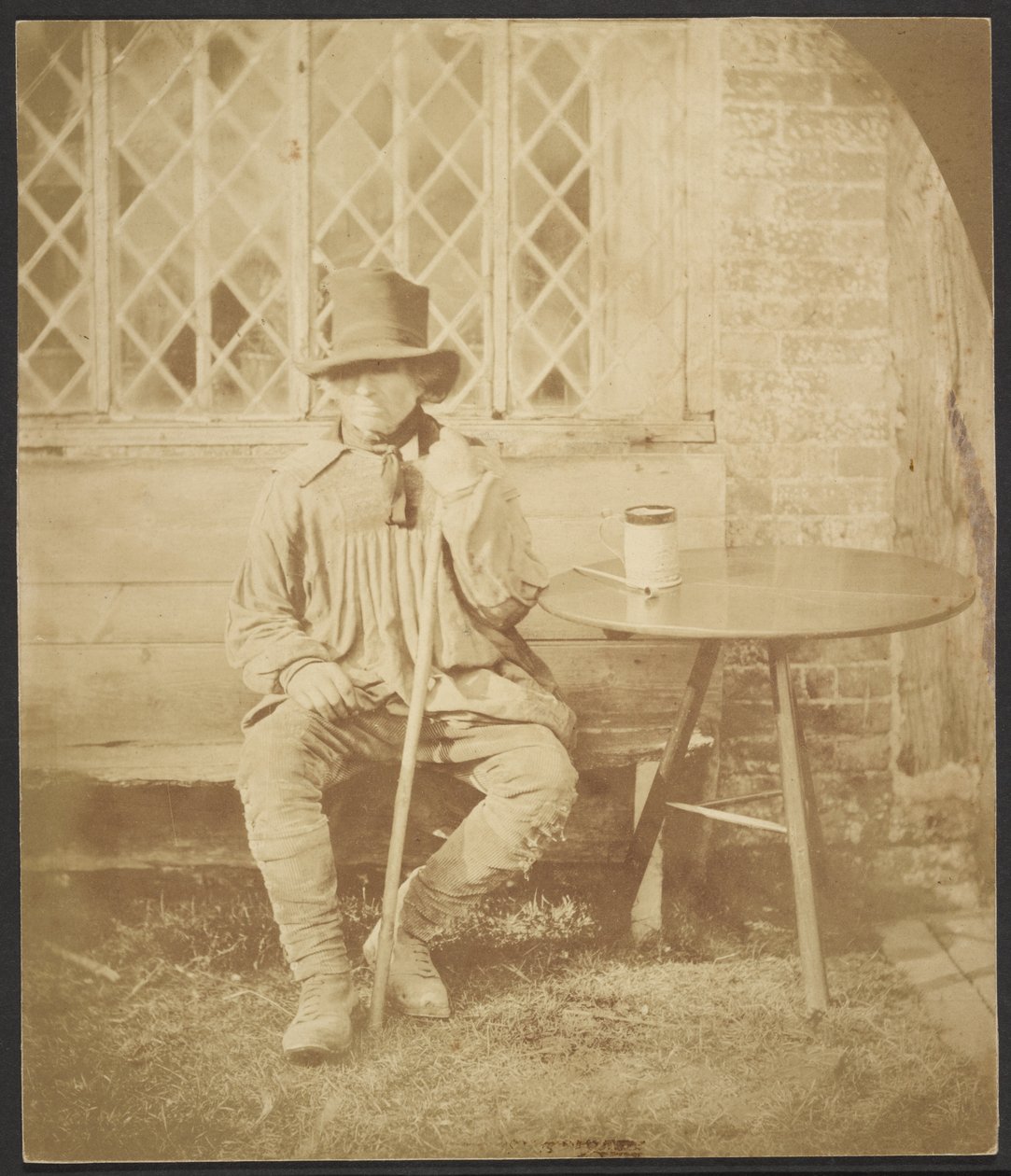 [Hombre sentado a la mesa] de John Whistler