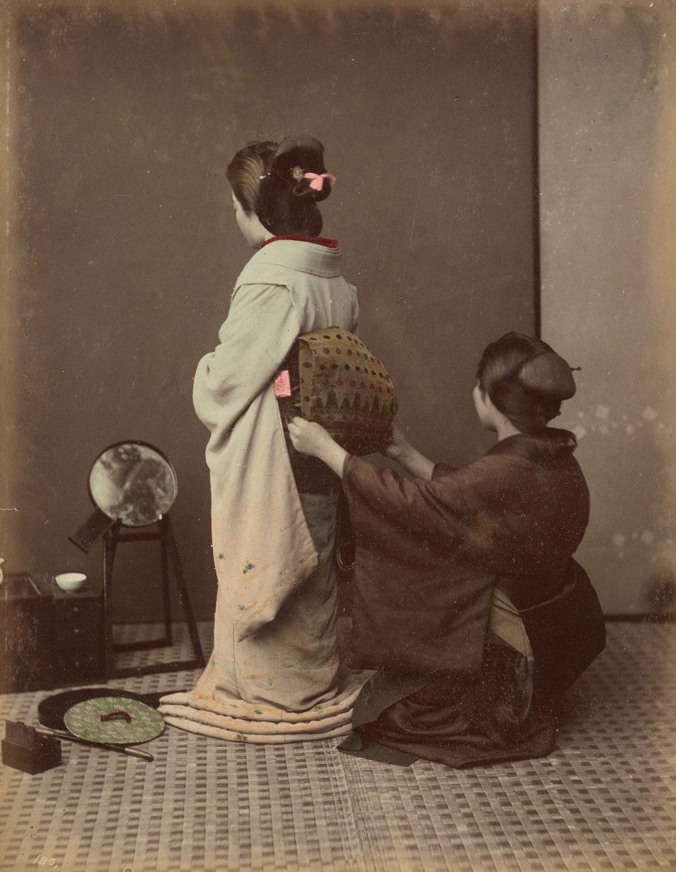 Vestir a Obi de Kusakabe Kimbei