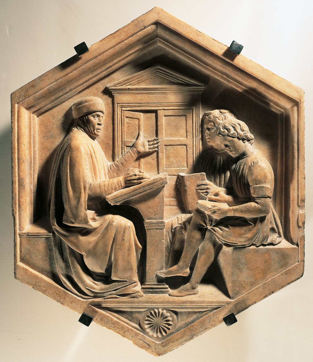 El erudito Prisciano enseñando a dos estudiantes de Luca Della Robbia