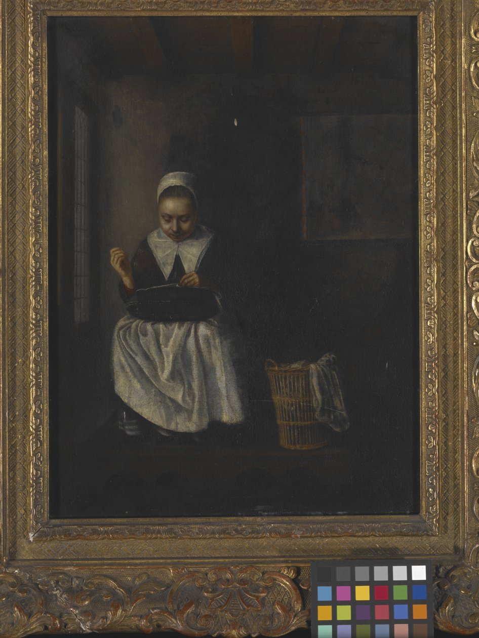 Una niña cosiendo (óleo sobre madera) de Nicolaes Maes