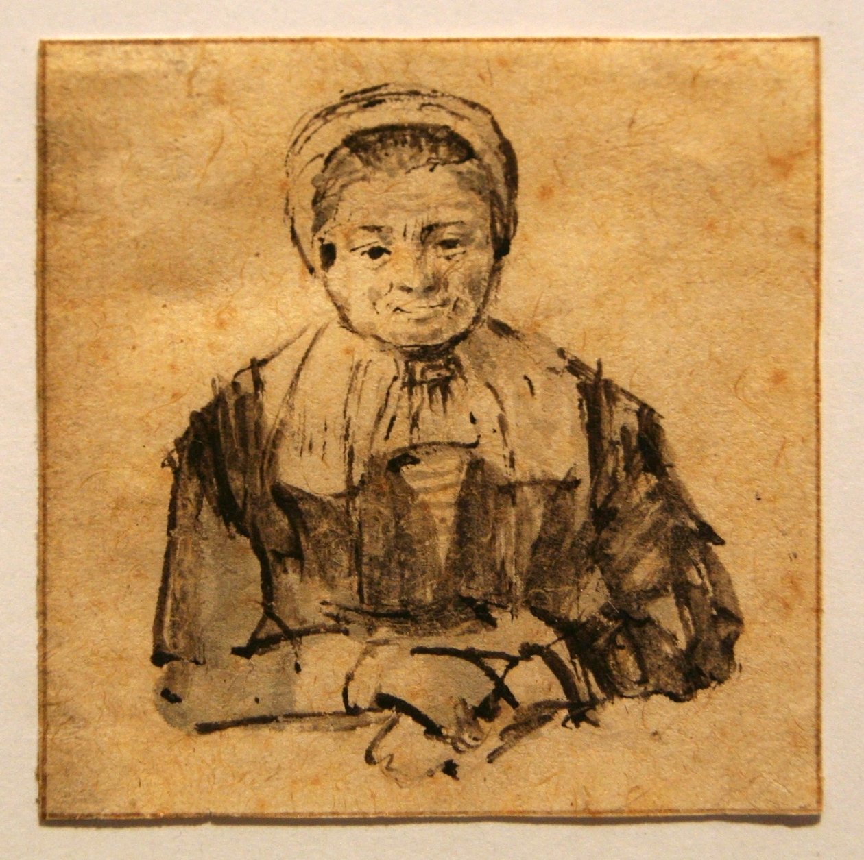 Anciana con manos juntas de Rembrandt van Rijn