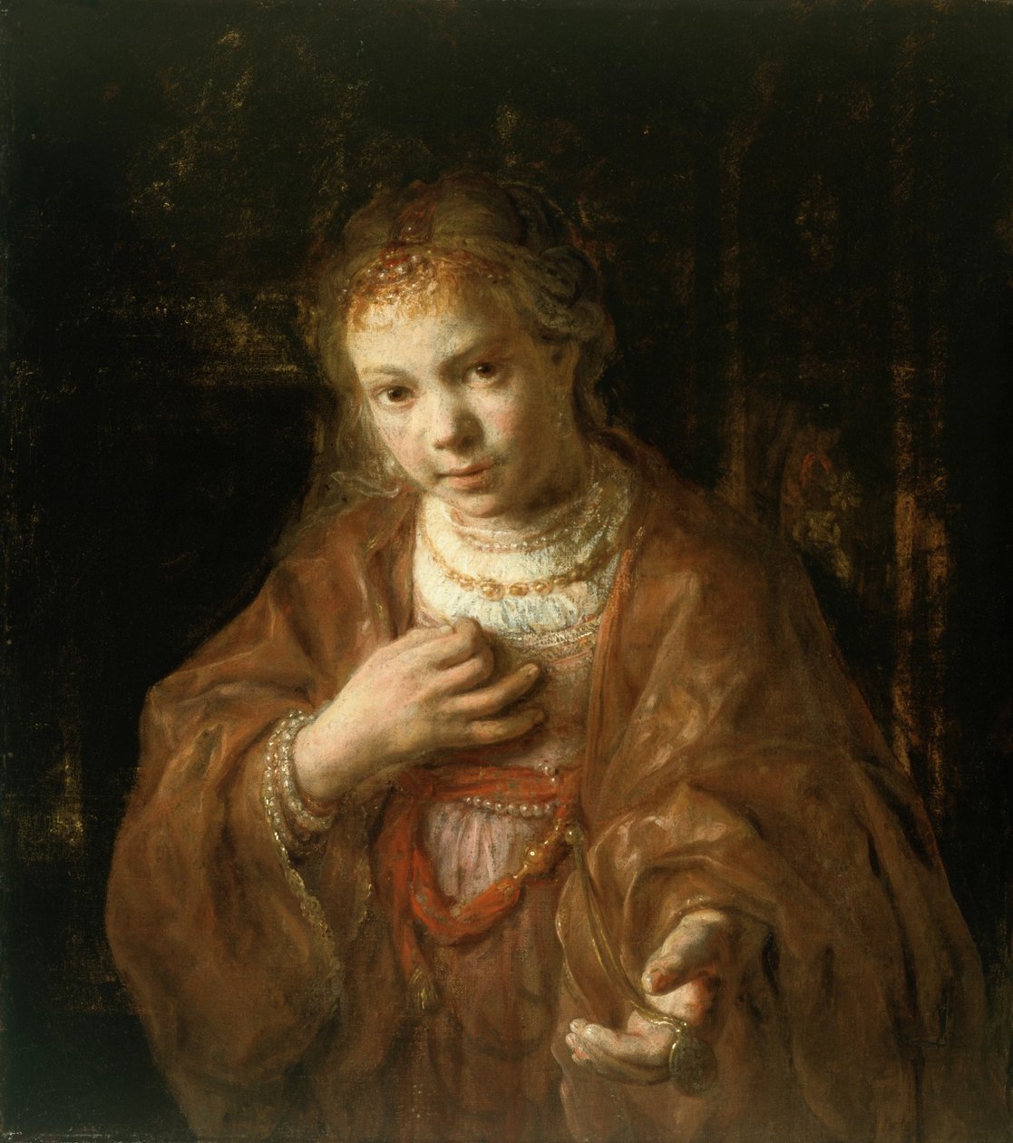 Joven sosteniendo una medalla de Rembrandt