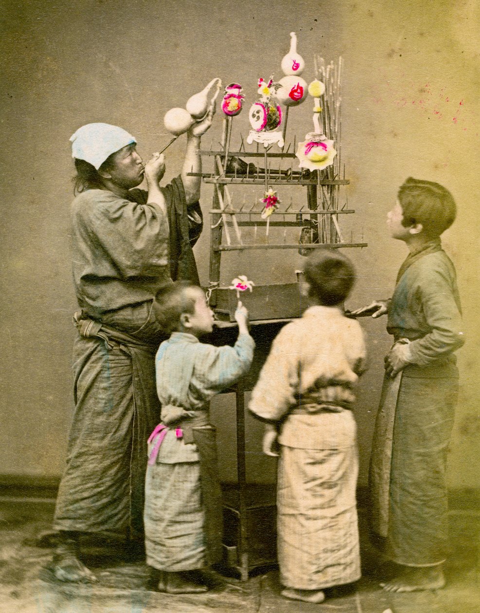Vendedor de globos. c1875 de Renjo Shimooka