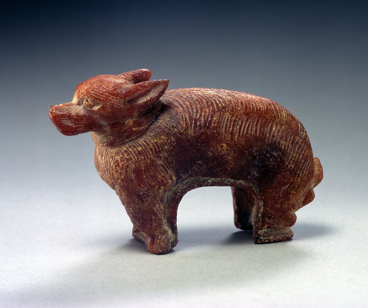 Figura de un perro (ámbar) de Roman