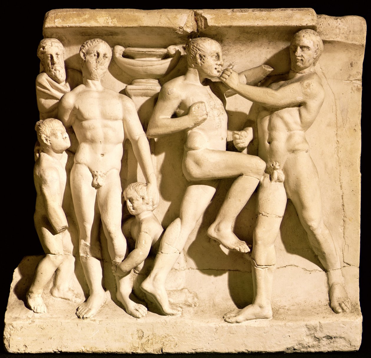 Relieve que representa luchadores de Roman