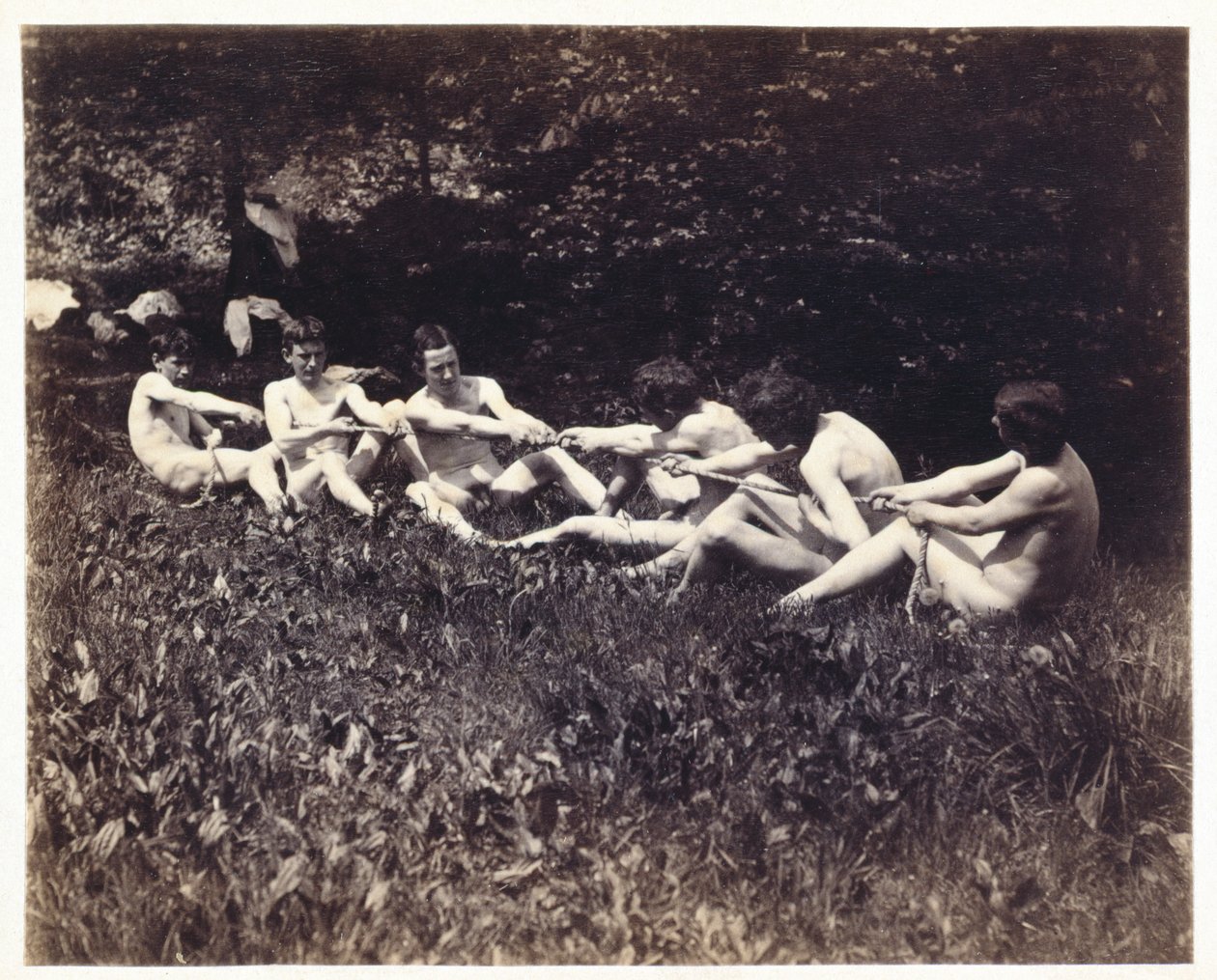 Desnudos masculinos en una competencia de tira y afloja, c.1883 de Thomas Eakins