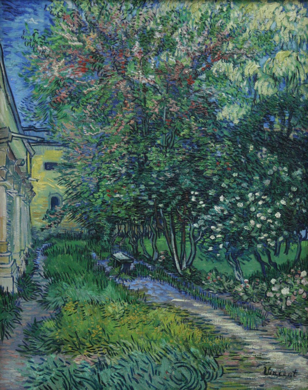 El jardín del asilo en Saint-Rémy de Vincent van Gogh