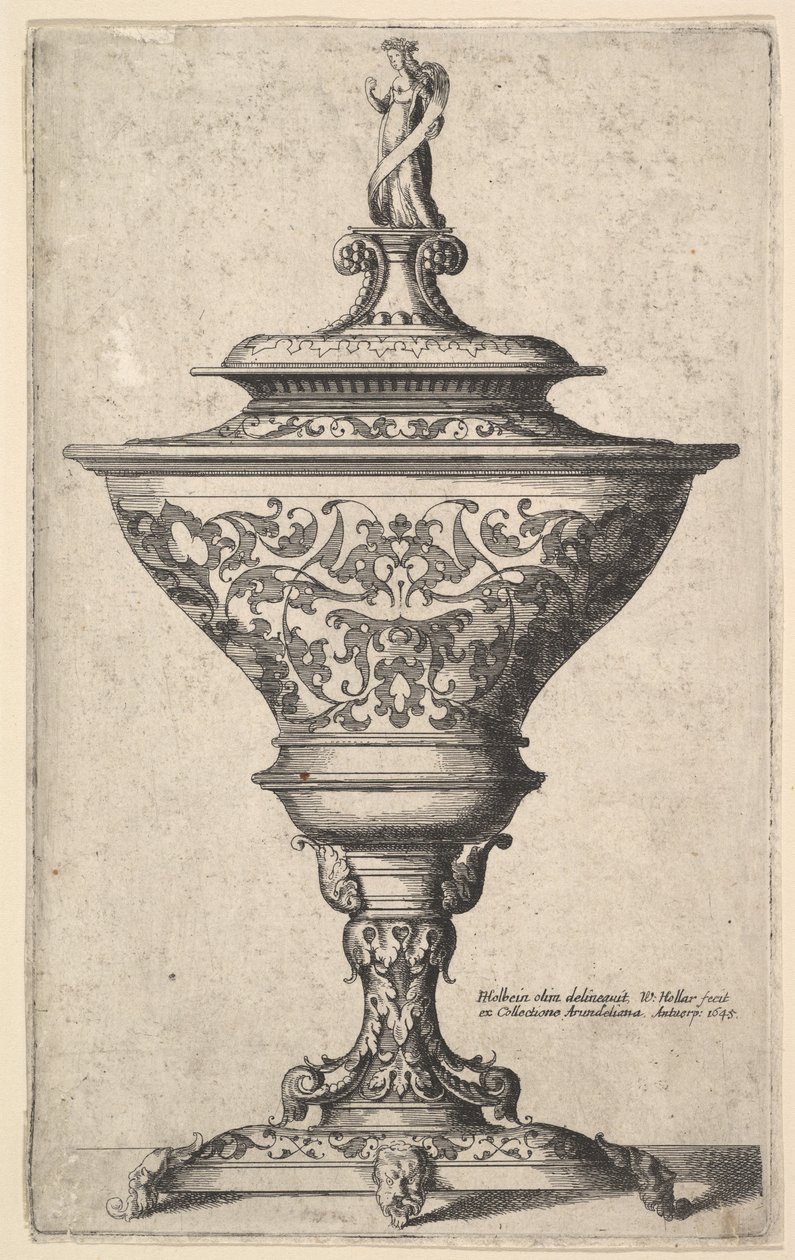 Copa ornamentada sobre pies de máscaras de Wenceslaus Hollar