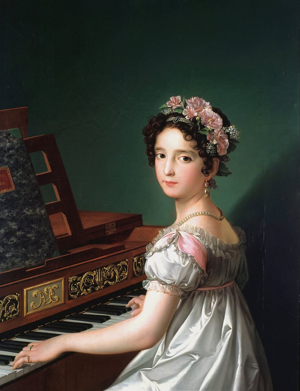 Manuela González Velázquez tocando el piano de Zacarias Gonzalez Velazquez