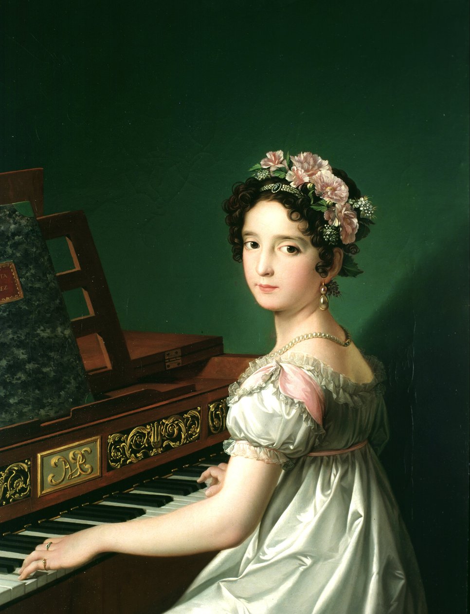 Manuela González Velázquez, tocando el piano de Zacarias Gonzalez Velazquez