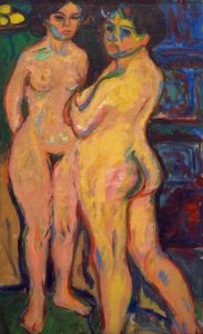 Niñas desnudas de pie junto al horno