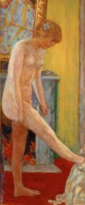 Joven desnuda frente a la chimenea
