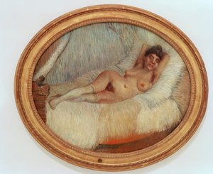 Desnudo femenino en una cama