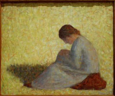 Campesina sentada en la hierba de Georges Seurat