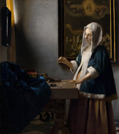 Mujer sosteniendo una balanza de Johannes Vermeer