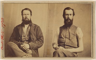 [Dos víctimas de la Guerra Civil no identificadas sentadas] de William H. Bell