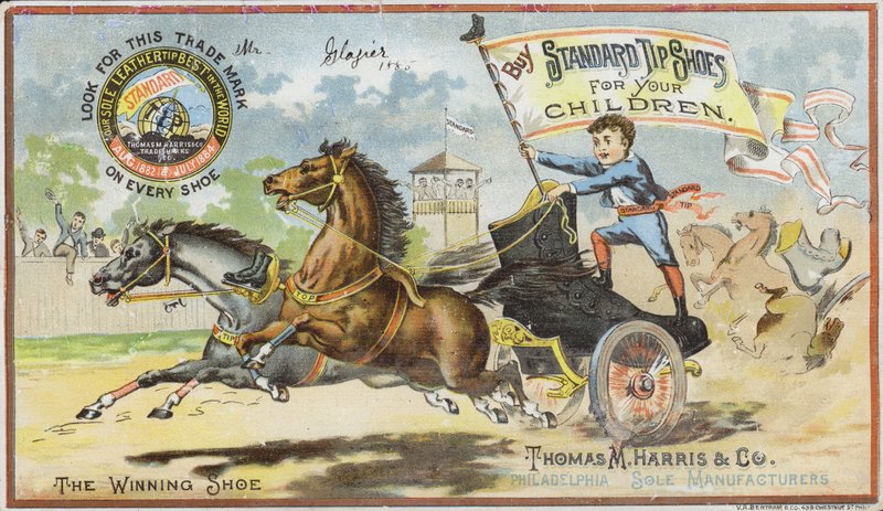 Niño en carrera de carros con bota de American School