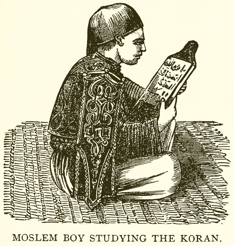 Niño musulmán estudiando el Corán de English School