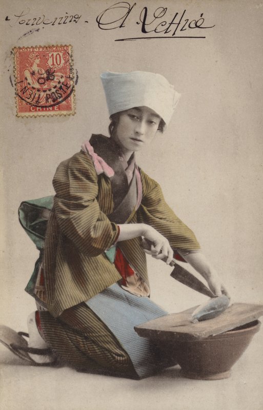 Niña japonesa fileteando pescado de French Photographer