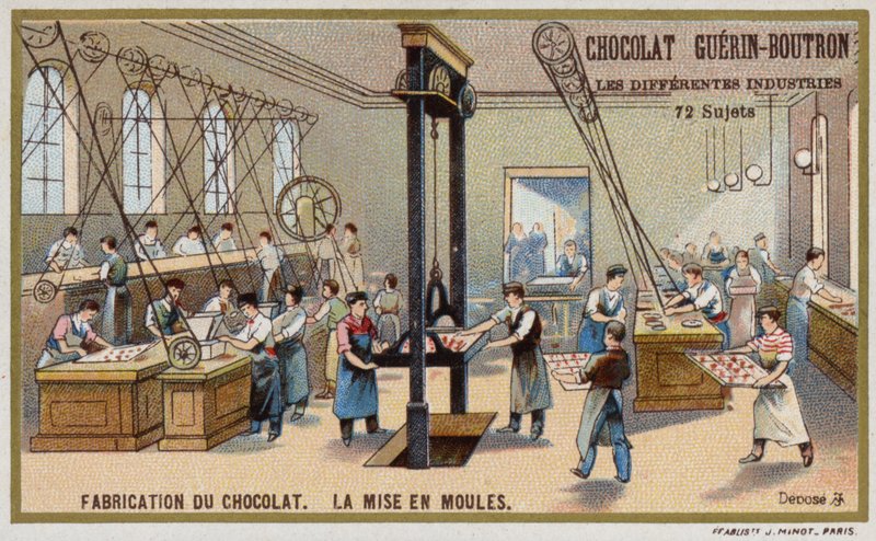 Fabricación de chocolate. Poniendo chocolate en moldes de French School